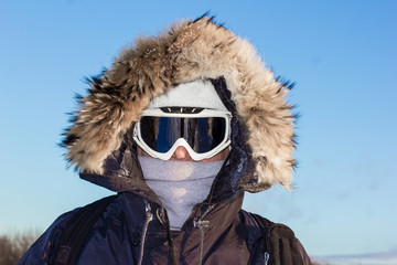 Fototapeta na wymiar portrait of man in ski goggles and hat