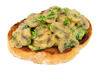 Creamy mushrooms on toast isolated on a white background