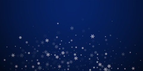 Sparse snowfall Christmas background. Subtle flyin