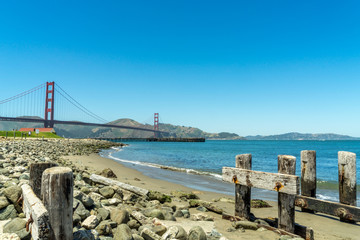 Golden Gate Bridge, remains of old wooden pier in foreground 