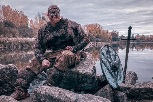 fierce viking warrior wounded in battle