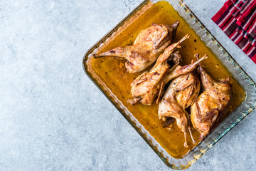 Roasted Crispy Quail Meat in Glass Bowl / Fried Small Chickens.