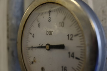 old pressure gauge on the wall