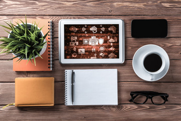 Business still life concept with office stuff on wooden table