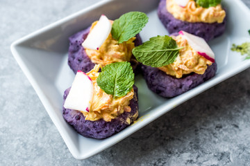 Red Cabbage Mash Hummus with Mashed Potatoes , Carrot, Yogurt and Mint Leaves for Appetizer / Healthy Round Canape Snacks