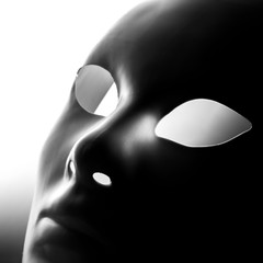 White mask on a light background