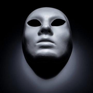 White mask on a black background