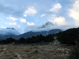 Man resting and watching the mountains meditation 