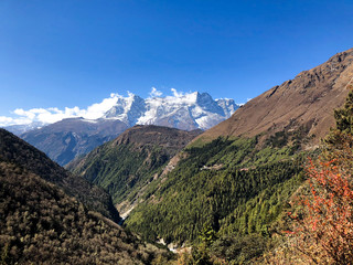 Man resting and watching the mountains meditation 