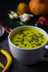 Pumpkin asian coconat cream soup. Autumn hot food