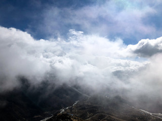 Fototapeta premium Man resting and watching the mountains meditation 