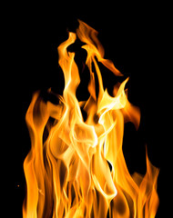 sparks of yellow bright flame on black