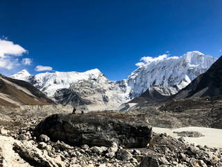 Fototapeta premium Man resting and watching the mountains meditation 