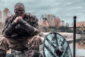 fierce viking warrior wounded in battle - 234652377