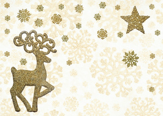 golden christmas deer under snowflakes