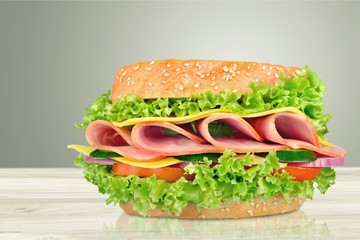 sandwich with ham, cheese and tomato isolated on white