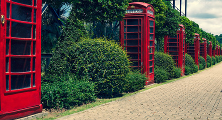 English phone booths in the national park of thailand (cross process)