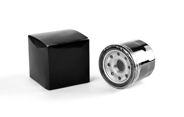 Oil filter. Close up. Isolated on white background.