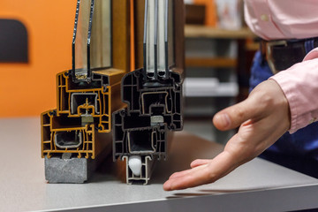 A man demonstrate energy efficiency of windows