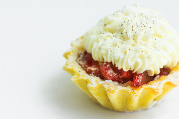 Shortbread Mini Tart with Strawberry Jam and Whipped Buttercream Frosting on White Background. Elegant European French Wedding Pastries and Desserts. Holiday Baking Concept Recipe Template