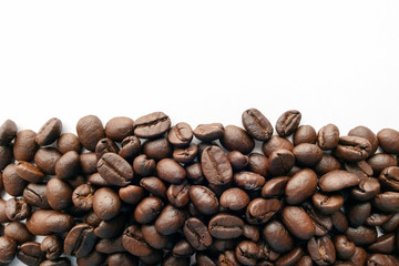 Roasted coffee beans for background.