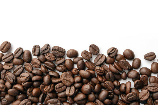 Roasted coffee beans for background.