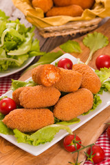 Supplì, italian fried rice balls. 