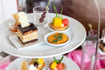 Collection of delicious dessert for party or wedding, gastronomy, event organization concept.