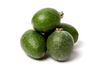 Green feijoa fruits on white background.