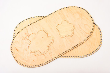 Concept wooden geometric figure pattern on a white background.