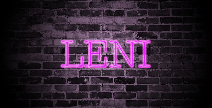 first name Leni in pink neon on brick wall