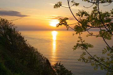 Fototapeta na wymiar Sunset over sea at Devon, England