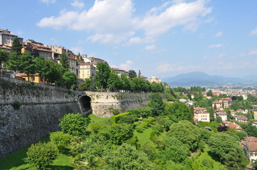 Fototapeta na wymiar City of Bergamo in Italy. Panorama of the European city on a sunny summer day. Homeland Trufaldino.
