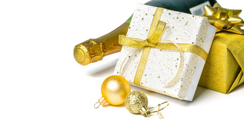 Christmas concept - silver and gold presents with confetti and ribbon