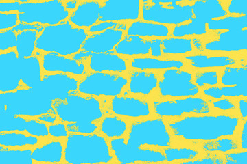 Background from the relief texture of a stone wall painted with yellow-blue paints.