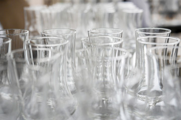 Glass glasses for sparkling wine. On the bar counter, close-up.