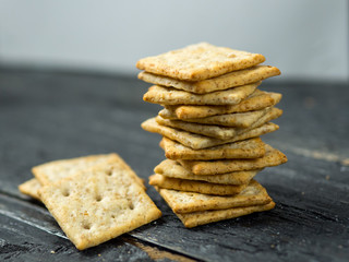 Crackers with cereals on a wooden table