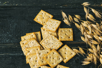 Crackers with cereals on a wooden table