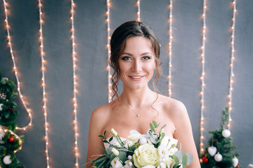 happy and young bride in a gentle dress in eco style.
