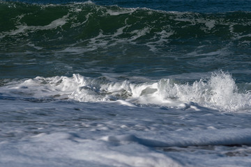 Breaking Atlantic ocean wave, Nazare, Portugal.