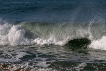 Breaking Atlantic ocean wave, Nazare, Portugal.