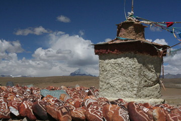 Kailas mountain and Tibetan chorten with terracotta stones