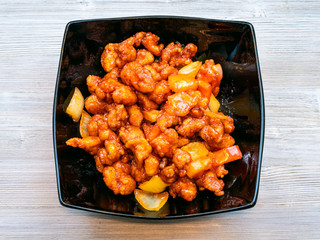 top view of Sweet and Sour Chicken on gray table