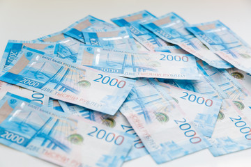 Background Of Paper Russian Money. New Russian Banknotes Of 2000 Two Thousands Rubles.