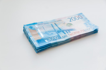 Background Of Paper Russian Money. New Russian Banknotes Of 2000 Two Thousands Rubles.
