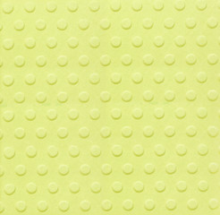 Polka dot textured paper background.