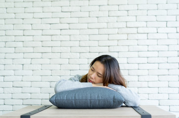 Fototapeta na wymiar close up young woman sleeping on pillow at living room