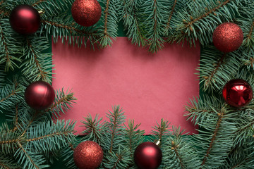 Christmas red blank with evegreen branches . Merry christmas greeting card, banner, frame.