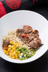 Asian noodles soup with chicken meat