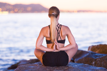 Woman 25-35 years old is meditating